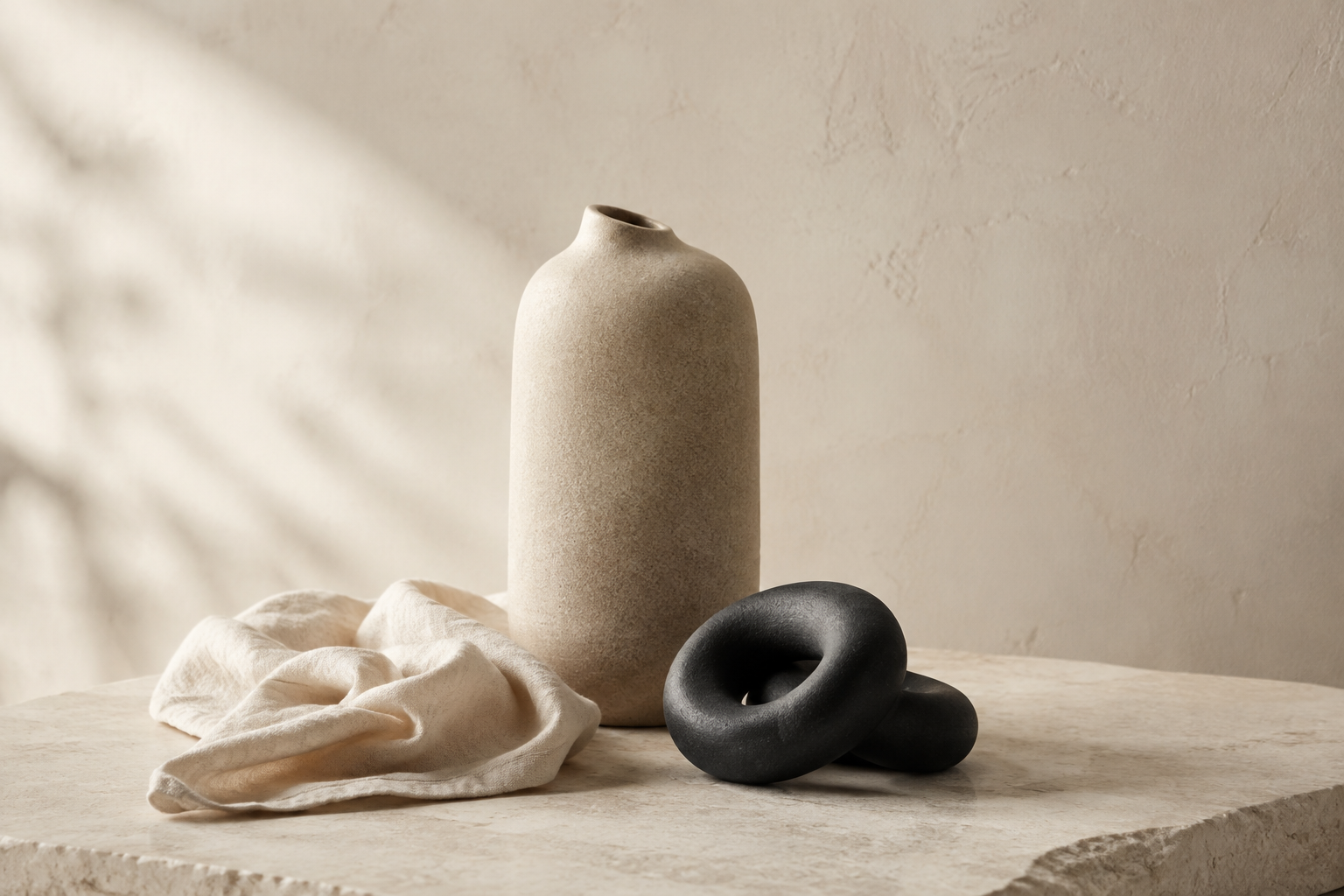 Sculptural stoneware and natural linen